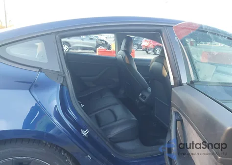 2021 Tesla Model 3 Standard Range Plus Rear-Wheel Drive z USA, uszkodzony, nr VIN 5YJ3E1EA8MF092097